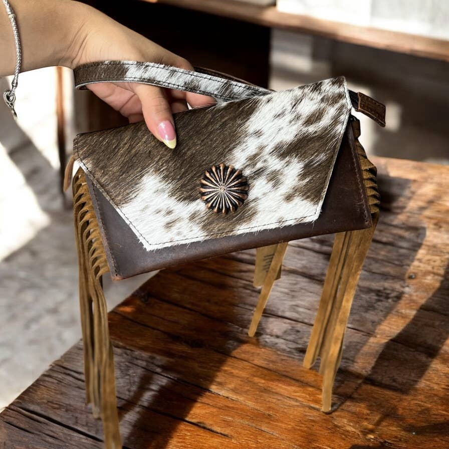 Brown cowhide wristlet