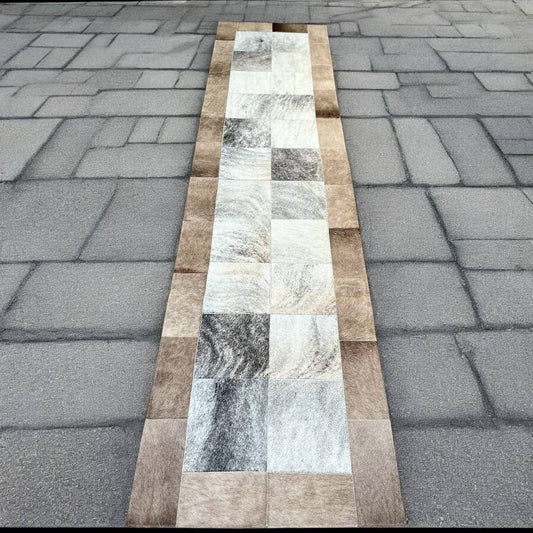 Cowhide patchwork runner rug 8x2’