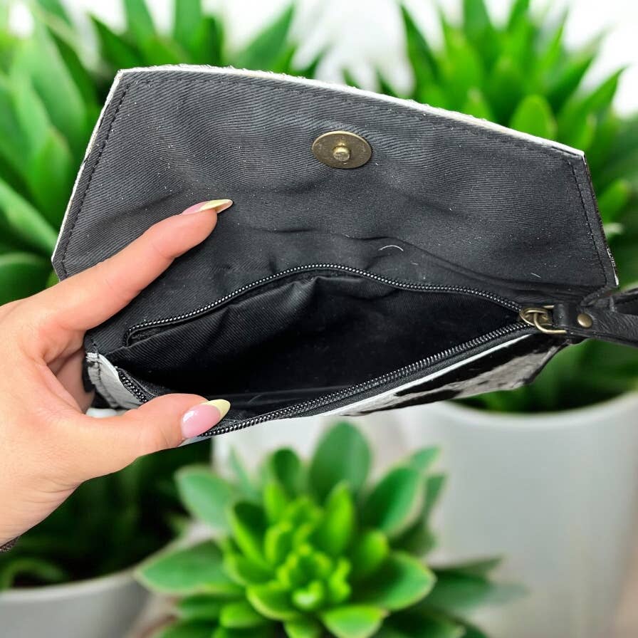 Brown cowhide wristlet