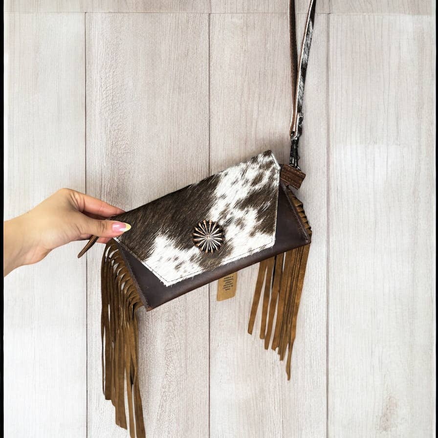 Brown cowhide wristlet