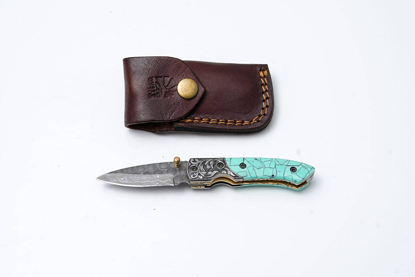 Turquoise Damascus Folding Knife – Hand Engraved Bolster Edition
